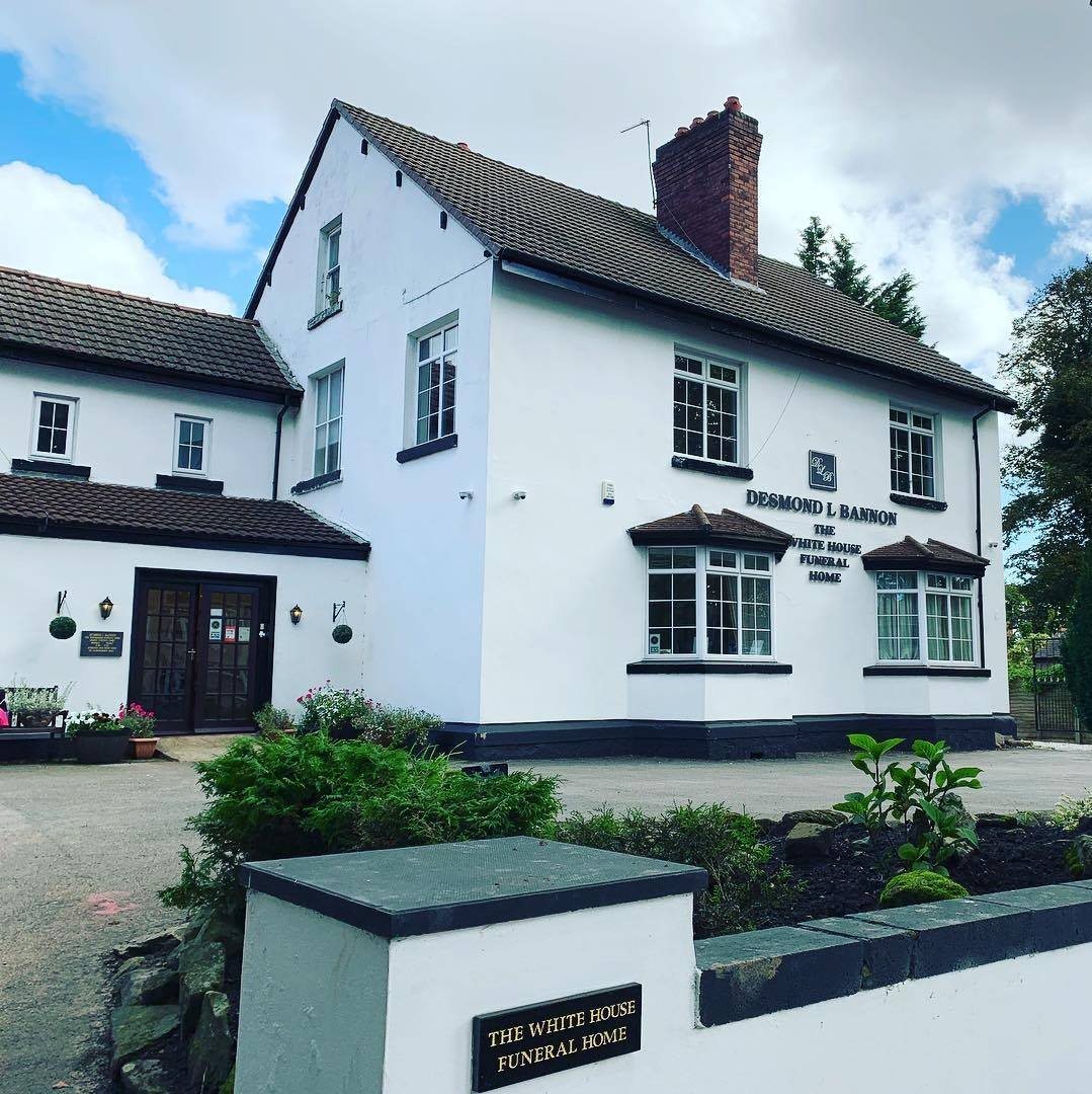 The White House funeral home on Broad Green Road, a white-fronted house with a gatepost sign